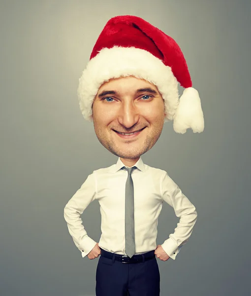 Smiley bighead man in santa hat — Stock Photo, Image