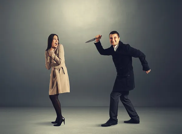 Mujer y hombre con cuchillo —  Fotos de Stock