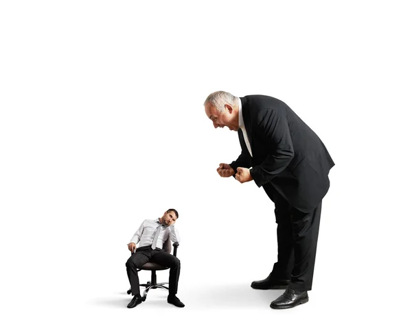 Boss screaming at small lazy worker — Stock Photo, Image