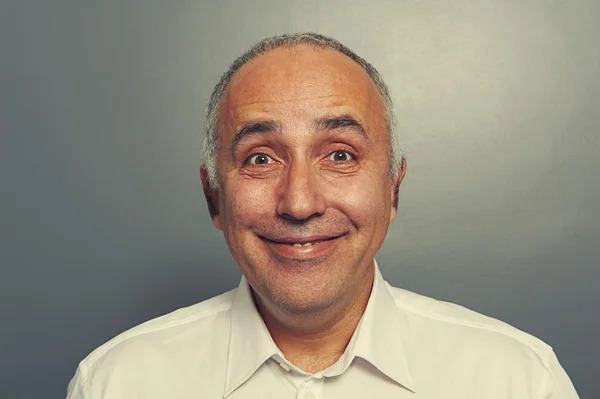 Funny excited man over dark — Stock Photo, Image