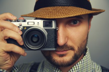 stylish handsome man with camera clipart