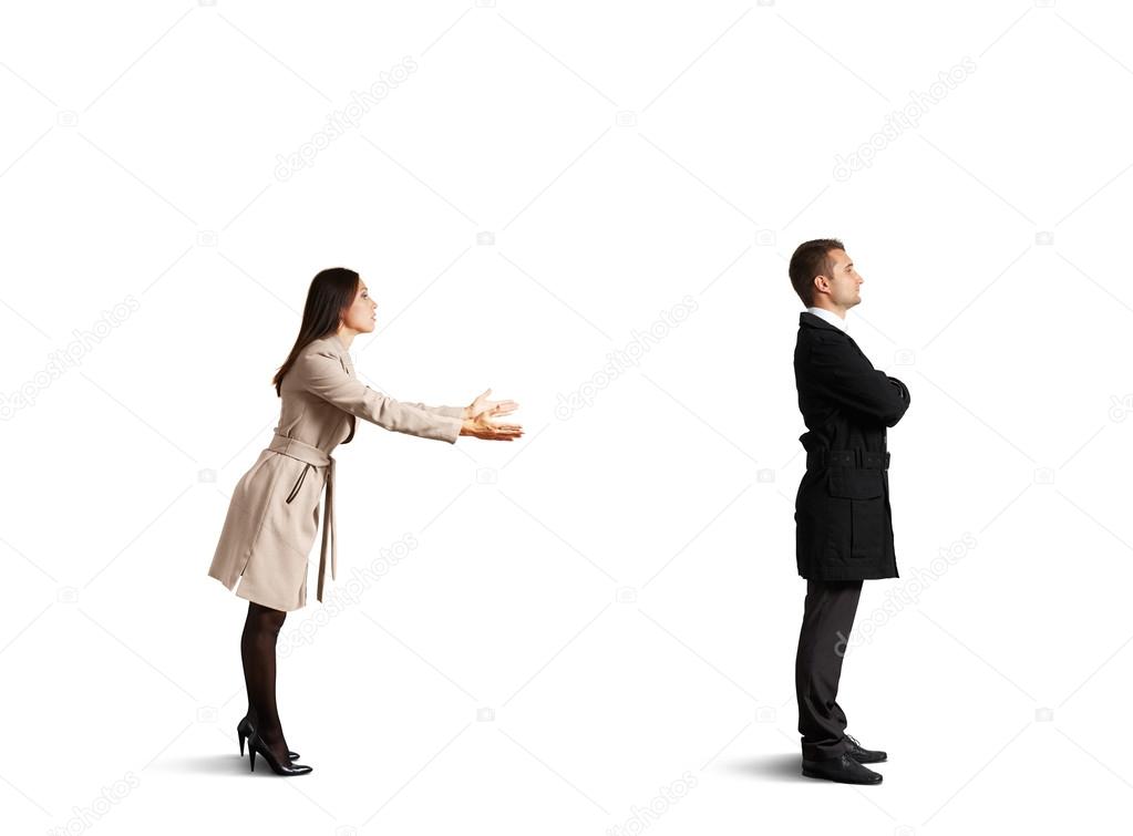 man standing near young woman