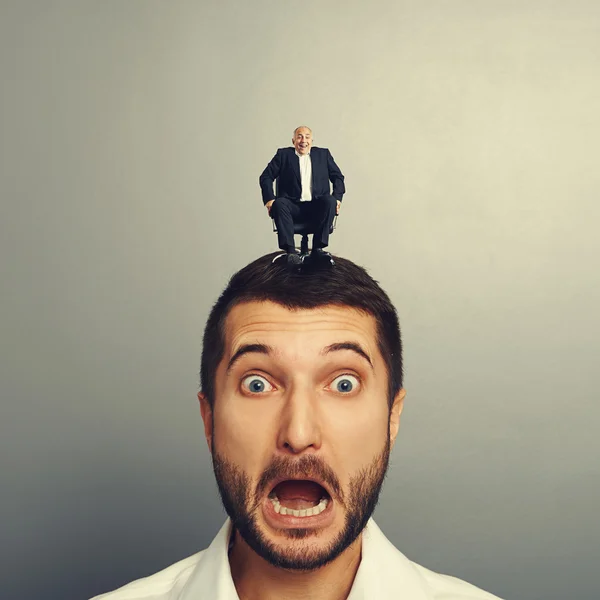Scared man with laughing boss — Stock Photo, Image
