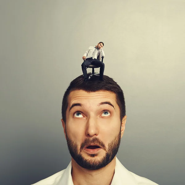 Amazed man looking at bored man — Stock Photo, Image