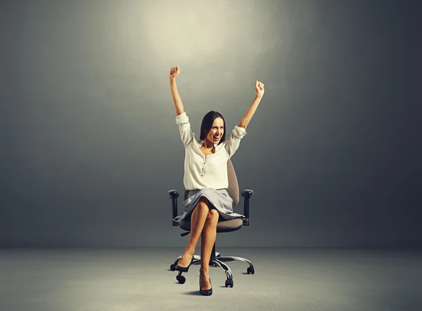 Woman raising hands up — Stock Photo, Image