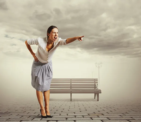 Businesswoman screaming at pointing — Stock Photo, Image