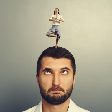 woman standing on the head of foolish man clipart