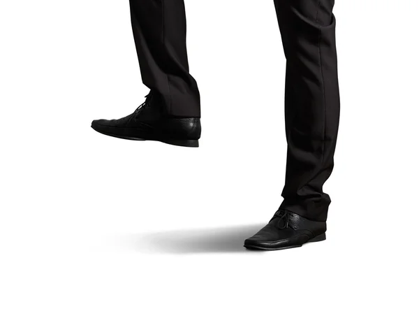 Legs in black trousers and shoes — Stock Photo, Image