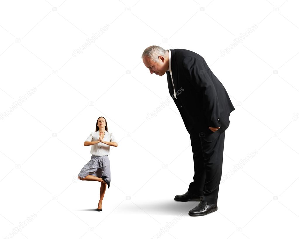 big boss looking at small meditation woman