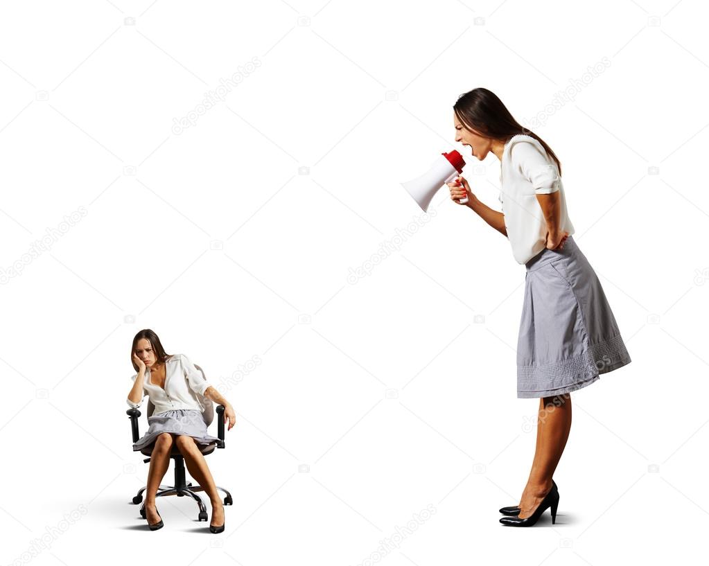 businesswoman screaming at lazy woman