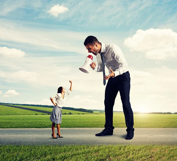 Emotional man and aggressive woman — Stock Photo, Image