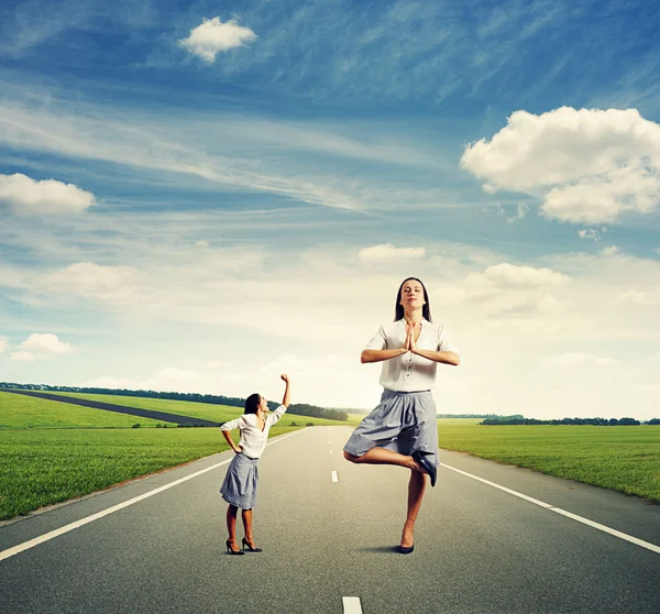 Small woman and calm big woman — Stock Photo, Image