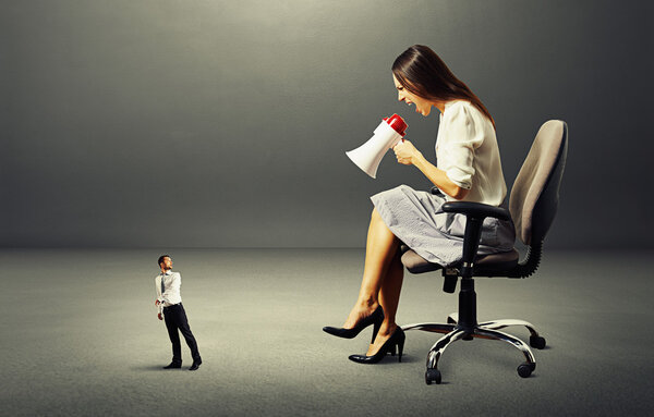 man going away from angry woman