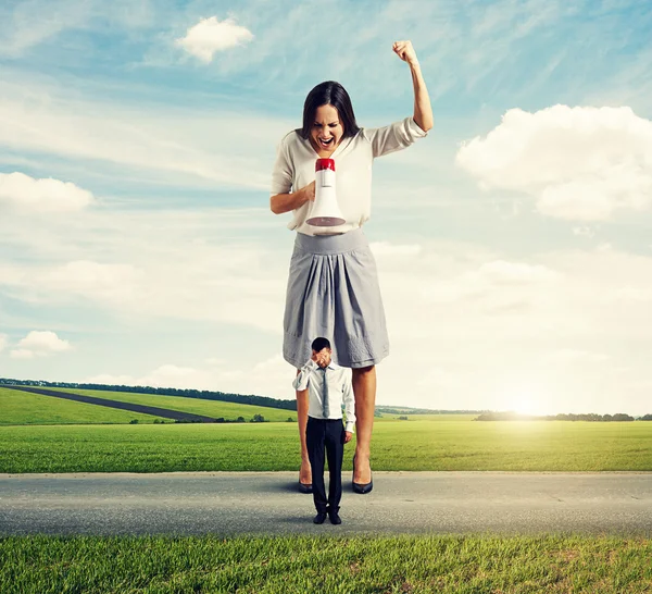 Young woman and sad man — Stock Photo, Image