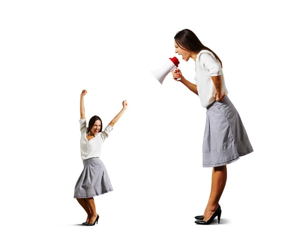 Cheerful woman and angry big woman — Stock Photo, Image