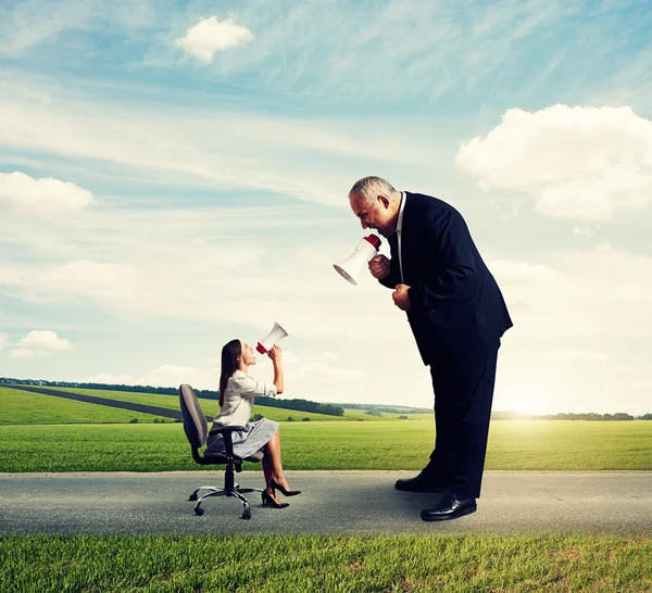 Discontented woman and emotional man — Stock Photo, Image