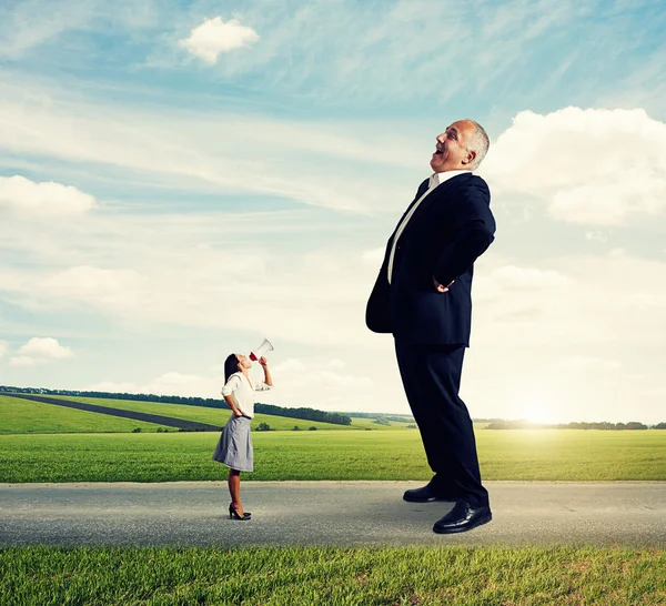 Laughing senior man and screaming woman — Stock Photo, Image