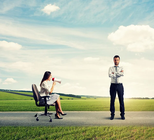 Young woman and serious calm man — Stock Photo, Image