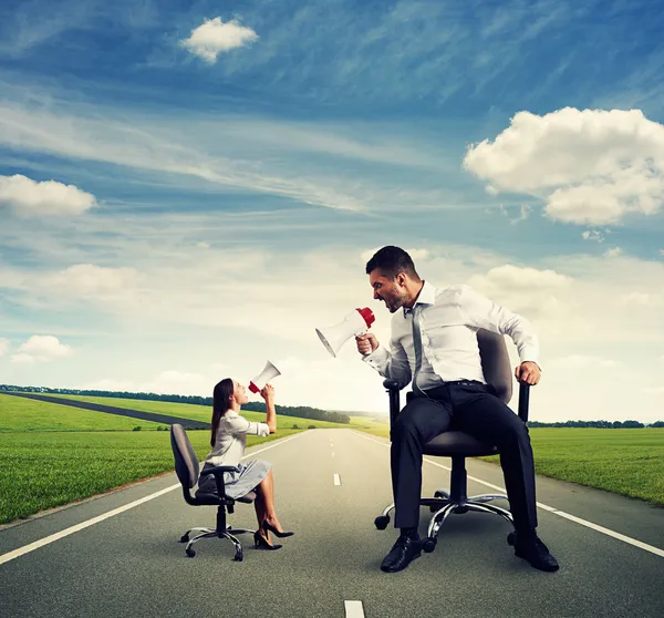 Aggressive man and emotional woman — Stock Photo, Image