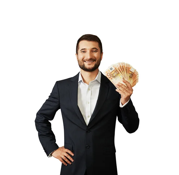 Uomo in possesso di carta moneta — Foto Stock