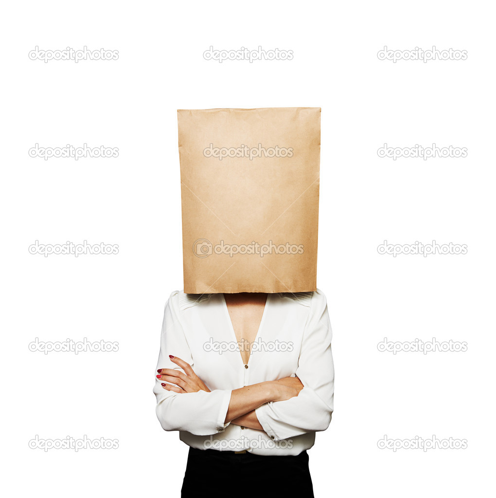 businesswoman hiding under paper bag