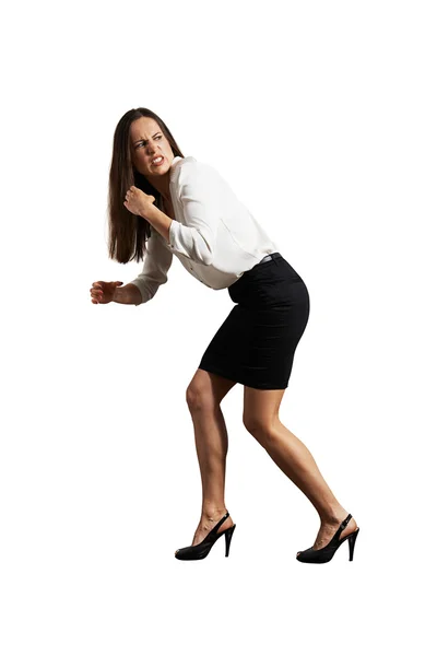 Businesswoman pulling invisible rope — Stock Photo, Image
