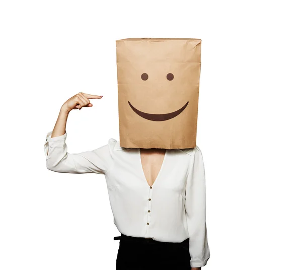 Woman pointing at bag on the head — Stock Photo, Image