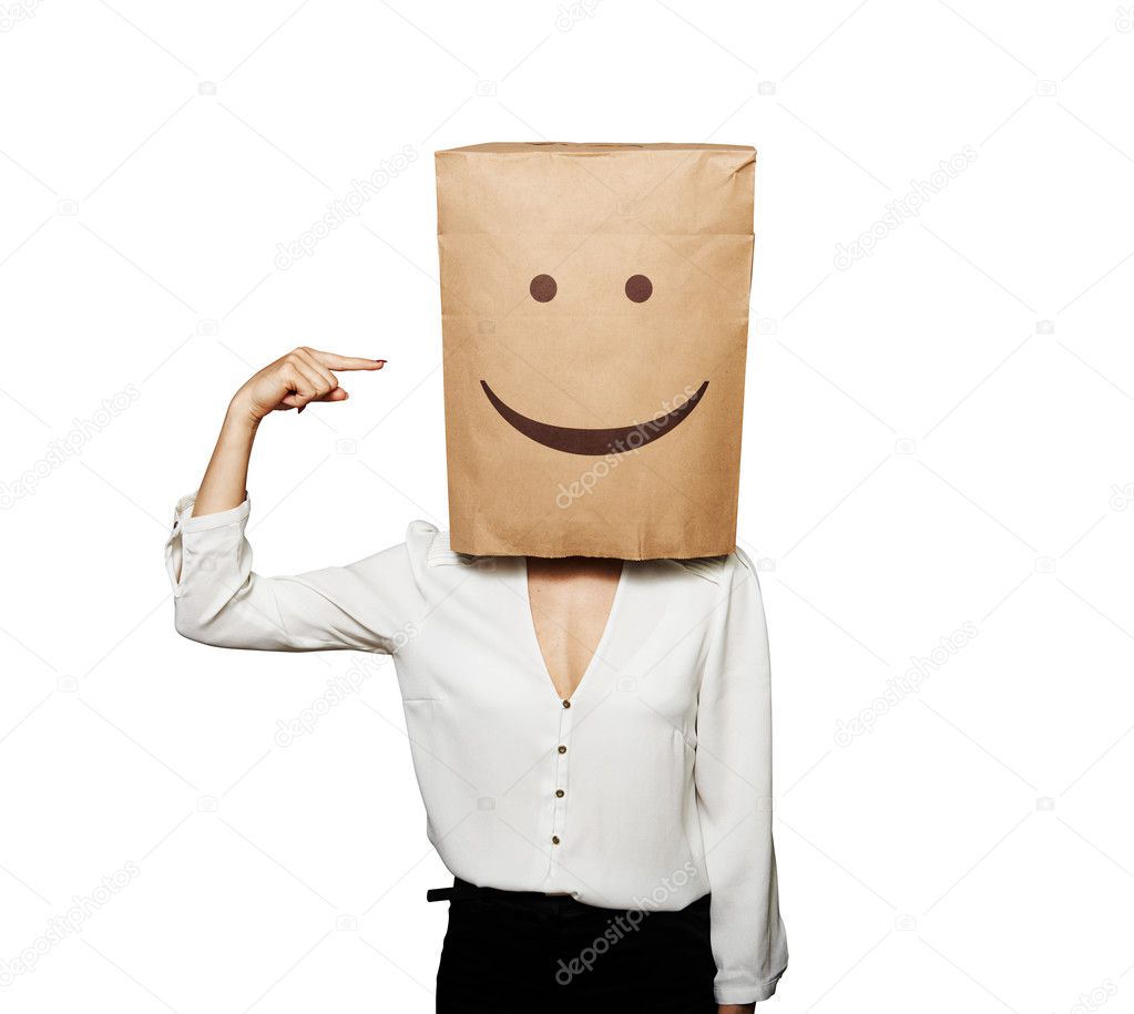 woman pointing at bag on the head