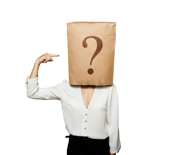 Woman pointing at question — Stock Photo, Image