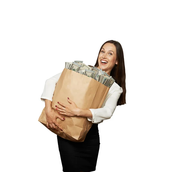 Woman holding bag with money — Stock Photo, Image