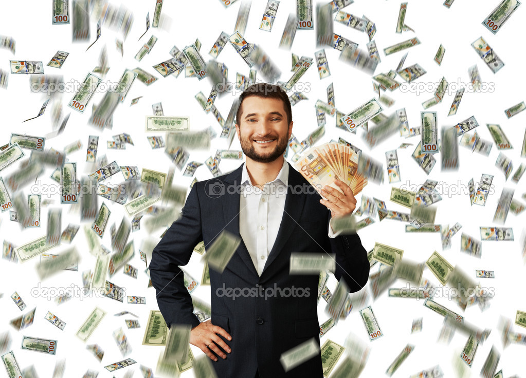man with euro standing under money rain