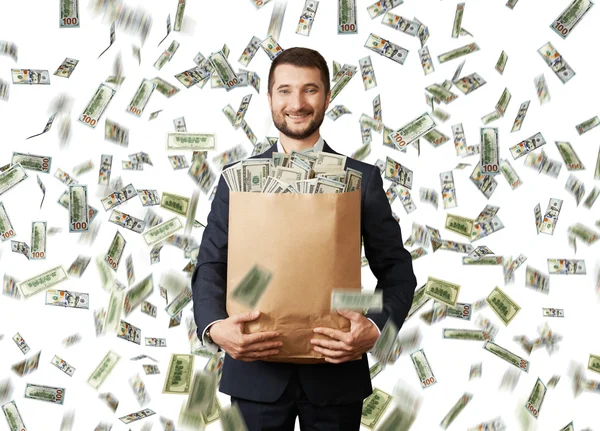 Smiley businessman with money — Stock Photo, Image