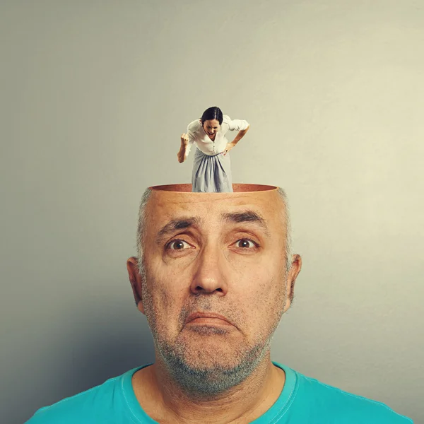 Angry woman in the head of depressed man — Stock Photo, Image