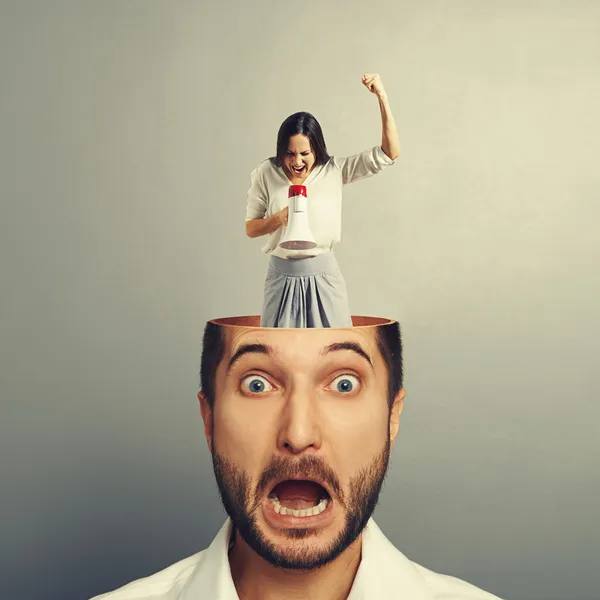 Stressed businessman with screaming woman — Stock Photo, Image