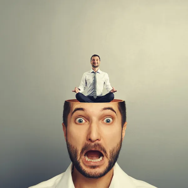 Stressed businessman with open head — Stock Photo, Image