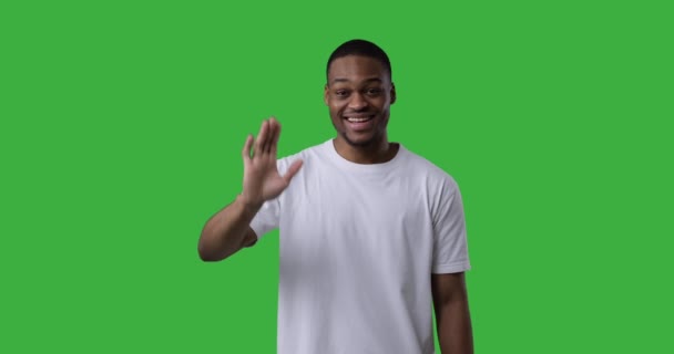 Happy man waving hand and greeting hello — Stock Video