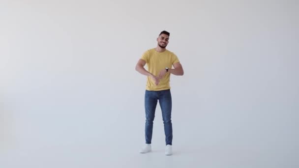 Happy young man with arms crossed — Stok Video