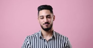 Unhappy businessman giving thumbs down gesture