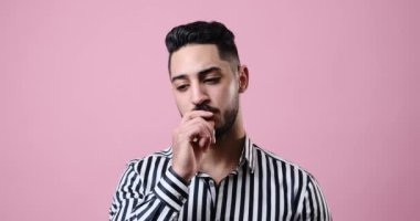 Confused businessman coming up with a good idea