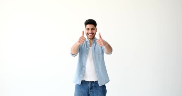 Man giving thumbs up gesture with both hands