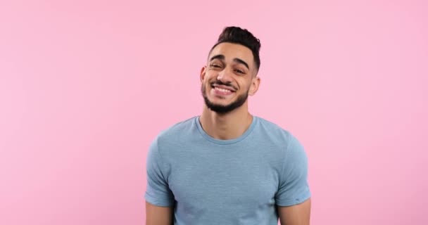 Portrait of doubtful man smiling — Stock video