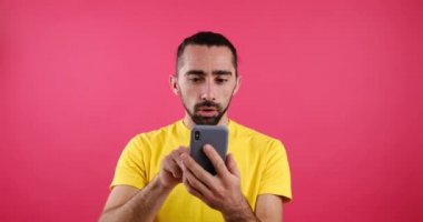 Man shocked on receiving unexpected good news using mobile phone