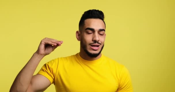 Bored man making blah blah gesture with hand — Stock Video