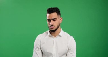 Disappointed man shaking his head