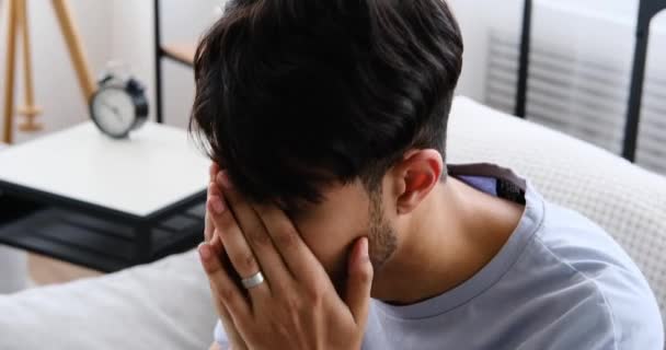 Sad crying man suffering with depression — стоковое видео