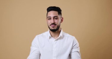 Frustrated young businessman talking and gesturing