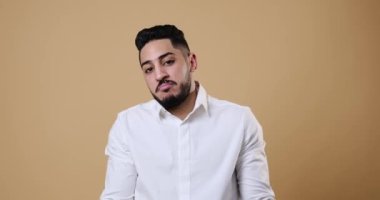 Doubtful businessman gesturing I dont know or cant help anything