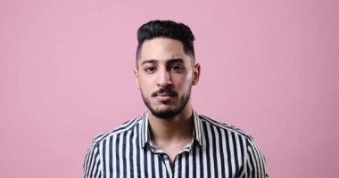 Businessman saying no by shaking his head and waving hand