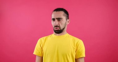 Disgusted man denying something unpleasant