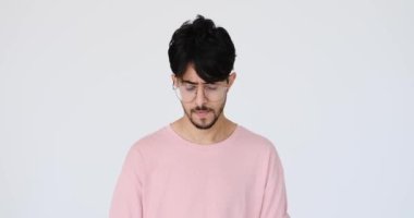 Disappointed man shaking his head